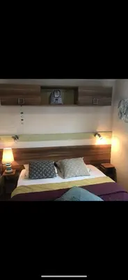 Un ou plusieurs lits dans un hébergement de l'établissement Mobil home