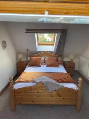 Un ou plusieurs lits dans un hébergement de l'établissement Rustic and spacious converted Barn