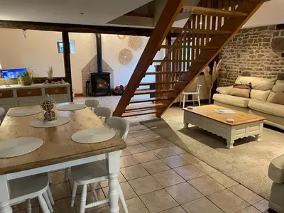 Coin salon dans l'établissement Rustic and spacious converted Barn