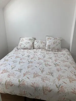 Un ou plusieurs lits dans un hébergement de l'établissement Maison 4-8 personnes, jardin, Sainte Mère Eglise