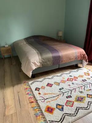 Un ou plusieurs lits dans un hébergement de l'établissement Maison spacieuse