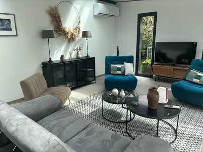 Coin salon dans l'établissement Maison spacieuse