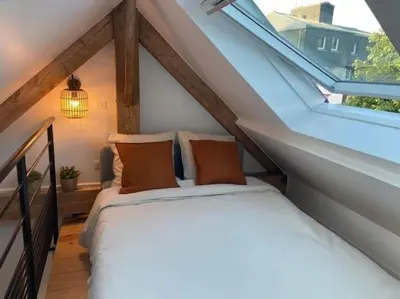 Un ou plusieurs lits dans un hébergement de l'établissement Le Patio, Hyper centre rue au calme avec parking