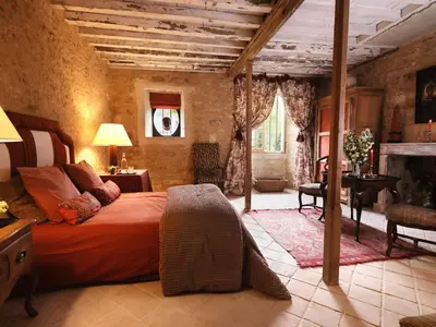 Un ou plusieurs lits dans un hébergement de l'établissement Magnifique Château d'Hémevez au coeur de la presqu'île du Cotentin