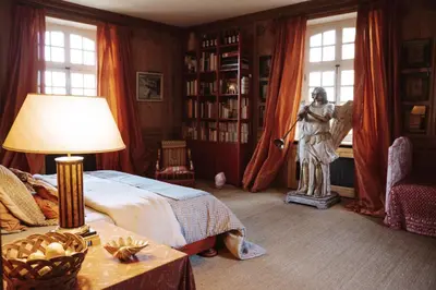 Un ou plusieurs lits dans un hébergement de l'établissement Magnifique Château d'Hémevez au coeur de la presqu'île du Cotentin