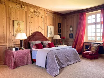 Un ou plusieurs lits dans un hébergement de l'établissement Magnifique Château d'Hémevez au coeur de la presqu'île du Cotentin