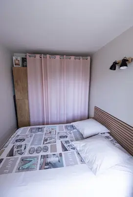 Un ou plusieurs lits dans un hébergement de l'établissement Bel appart près du port et de la plage