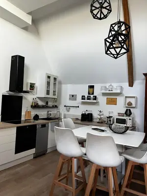 Cuisine ou kitchenette dans l'établissement Location Studio en Normandie