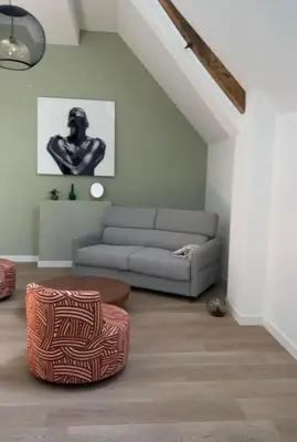 Coin salon dans l'établissement Location Studio en Normandie