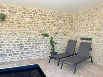 Coin salon dans l'établissement Le Logis Courtelay by Melrose