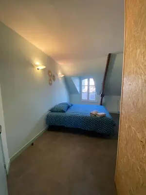Un ou plusieurs lits dans un hébergement de l'établissement Studio charmant à Cherbourg-en-Cotentin - 20m² - Parking