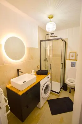 Salle de bains dans l'établissement La Duché - Appartement neuf central, calme, vue sur les toits de Cherbourg et Parking, intendance Luxury Host