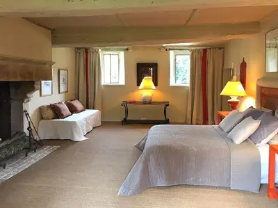 Un ou plusieurs lits dans un hébergement de l'établissement Gite du Petit Manoir au château d'Hémevez