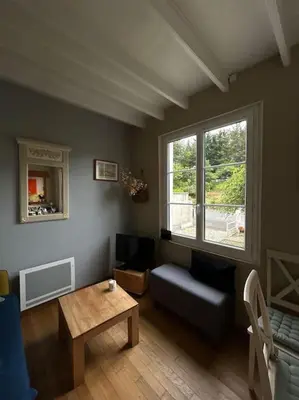 Coin salon dans l'établissement Maison à 50 m de la plage