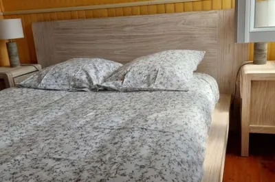 Un ou plusieurs lits dans un hébergement de l'établissement Maison à 50 m de la plage
