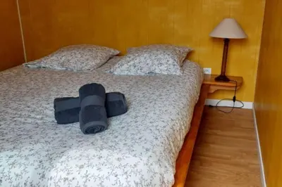 Un ou plusieurs lits dans un hébergement de l'établissement Maison à 50 m de la plage