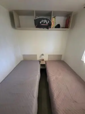 Un ou plusieurs lits dans un hébergement de l'établissement Mobil-Home Montmartin-sur-mer