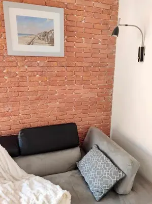 Coin salon dans l'établissement Maison près de la mer , les plages du débarquement