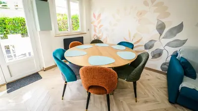 Coin salon dans l'établissement Maison calme éventail de Cabourg