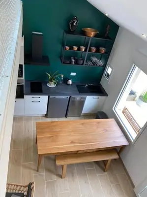 Cuisine ou kitchenette dans l'établissement Le Petit Ronsard