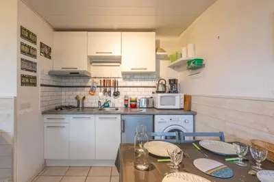 Cuisine ou kitchenette dans l'établissement Le Petit Cocon Marin - Appt à 200m de la plage