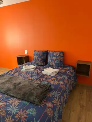 Un ou plusieurs lits dans un hébergement de l'établissement Maison Privé de bourg 4 personnes