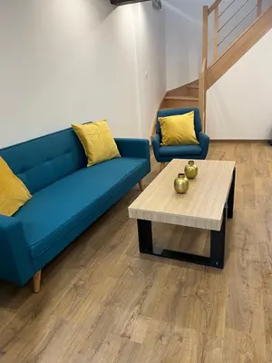 Coin salon dans l'établissement Maison Privé de bourg 4 personnes