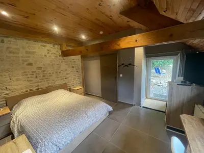 Un ou plusieurs lits dans un hébergement de l'établissement Chambre à la campagne la ch tite bauquerie