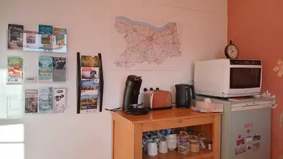 Cuisine ou kitchenette dans l'établissement La Maison de 1868