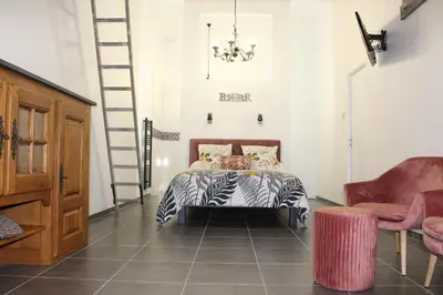 Un ou plusieurs lits dans un hébergement de l'établissement Chambre d'hôtes vue sur mer
