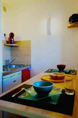 Cuisine ou kitchenette dans l'établissement Stosy Gare