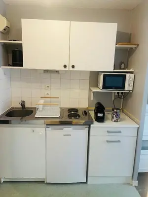 Cuisine ou kitchenette dans l'établissement Clos Guerin Saint Pierre