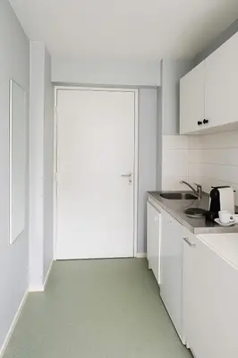 Cuisine ou kitchenette dans l'établissement Clos Guerin Saint Pierre