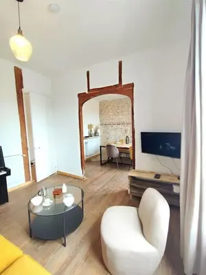 Télévision ou salle de divertissement dans l'établissement Caen au fil de l'eau
