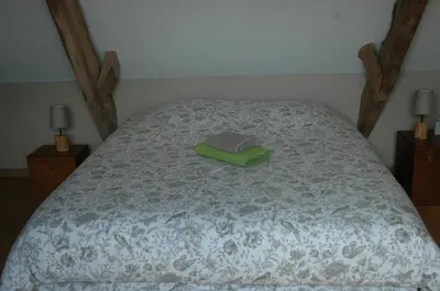 Un ou plusieurs lits dans un hébergement de l'établissement Chambre d'Hôte La Maison du Mesnil