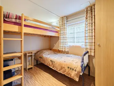 Un ou plusieurs lits dans un hébergement de l'établissement Holiday Home Rêves & Sérénité by Interhome