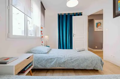Un ou plusieurs lits dans un hébergement de l'établissement Granville centre - Duplex 6 pers