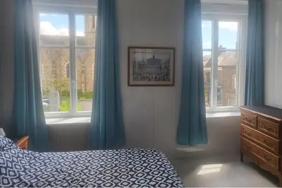 Un ou plusieurs lits dans un hébergement de l'établissement 1Bed Apartment Sleeps 2 - Parking Wifi