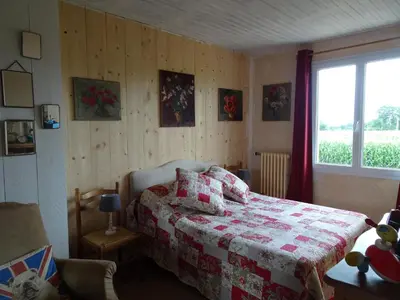 Un ou plusieurs lits dans un hébergement de l'établissement Country House in Normandy near Portbail Beach