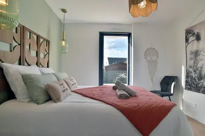 Un ou plusieurs lits dans un hébergement de l'établissement Cancale à la plage - Maison avec terrasse pour 6