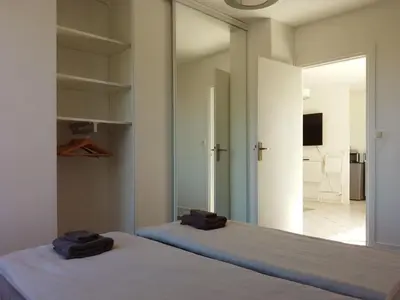 Un ou plusieurs lits dans un hébergement de l'établissement Downtown Apartment