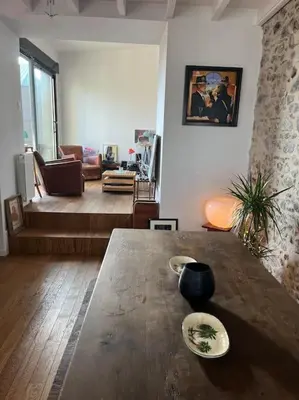 Coin salon dans l'établissement Charmant Cottage d'artistes