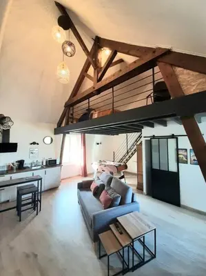 Coin salon dans l'établissement Loft proche Bayeux