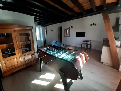 Télévision ou salle de divertissement dans l'établissement Loft proche Bayeux