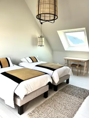 Un ou plusieurs lits dans un hébergement de l'établissement Maison familiale cosy proche mer Agon Coutainville