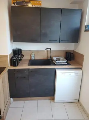 Cuisine ou kitchenette dans l'établissement Gîte Grand'elle