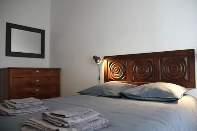 Un ou plusieurs lits dans un hébergement de l'établissement Maison au coeur de Cancale à 300m de la plage