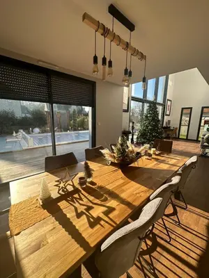 Coin salon dans l'établissement La Villa des Cotis