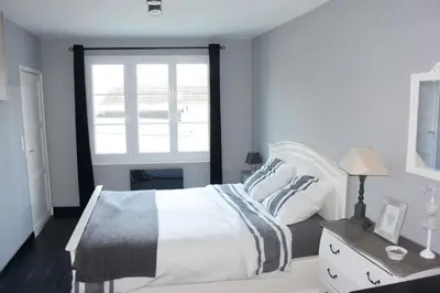 Un ou plusieurs lits dans un hébergement de l'établissement Le Baluchon Portais - Gîte de Charme