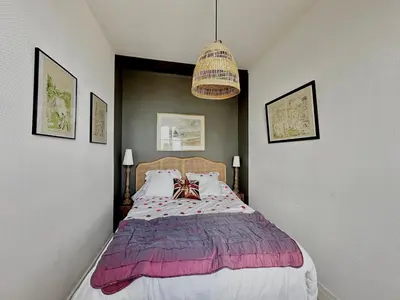 Un ou plusieurs lits dans un hébergement de l'établissement Bel Horizon, charmant appt avec balcon vue mer